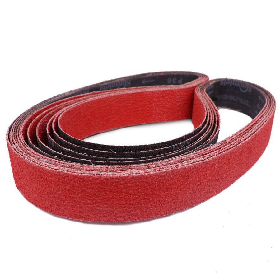 Coiled orange ceramic Shredder 2 x 72 sanding belts showing the abrasive grain texture